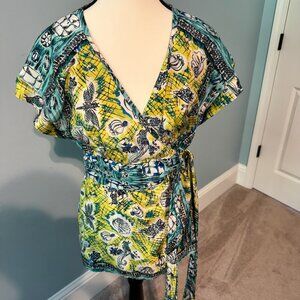 Wrap around green and yellow cross body blouse
